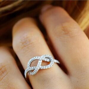 New INFINITY KNOT Silver plated Cubic Zirconia Ring
